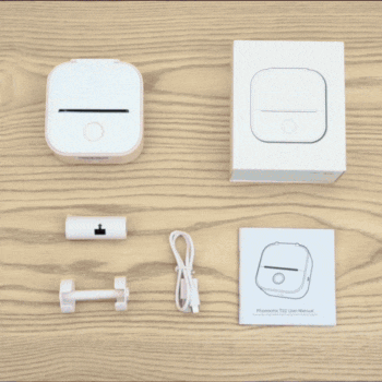 Unboxing the InkyLess Go™ package showing the mini printer, free thermal paper roll, and charging accessories